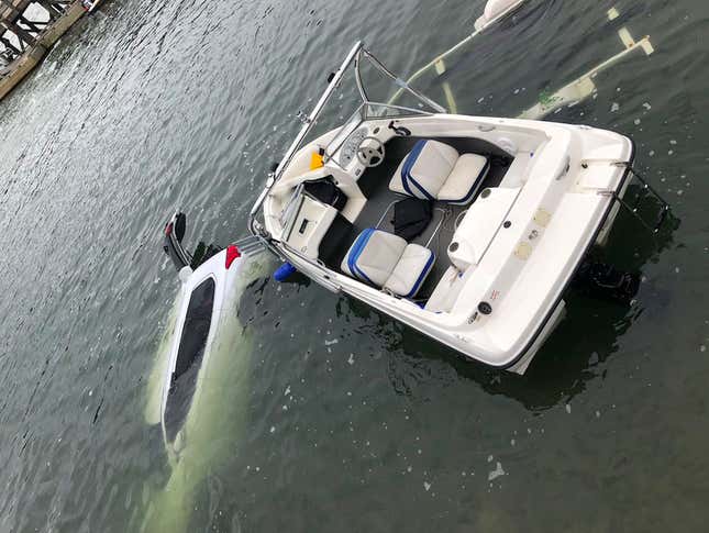 Man Nearly Run Over After Jumping out of a Boat Pulling His Car Into the Sea